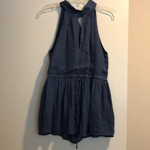 Romper with high neck line and open V neck
